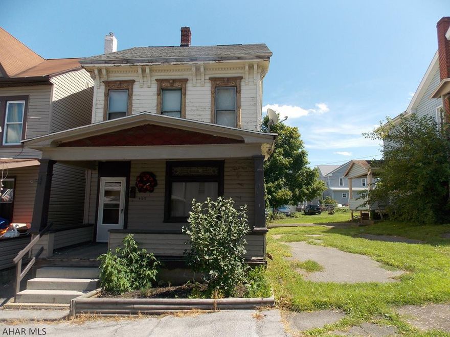 Great property for an investment portfolio! Large living room and dining room. 3 bedrooms on the 2nd floor and a finished attic on the 3rd floor that could be a 4th bedroom. Off -street parking and a fenced in yard.