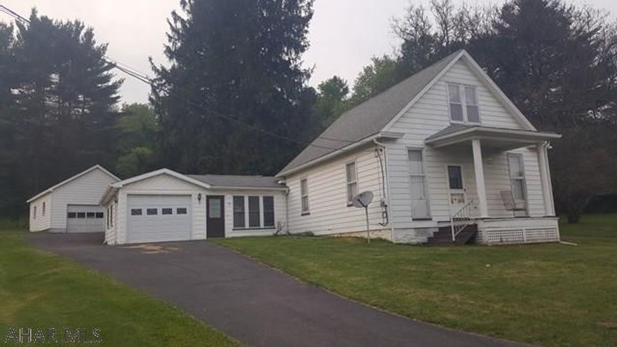 2 bedroom and 1 bathroom home on 5.7 acres. This home has an attached garage and a detached garage. Could use a little updating but is a great property. Beautiful yard and woods behind house. Minutes from Glendale Lake and Prince Gallitzin State Park.
