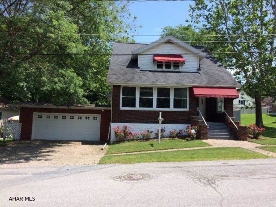 Beautiful 2 story brick house has 3 bedrooms, 1 1/2 baths. Features kitchen with granite counter tops, refinished hardwood floors on first floor, plaster walls were redone on first floor and outer walls have blown in insulation. Home has beautiful pocket doors and french doors. The heated enclosed front porch is perfect for relaxing or enjoy a barbecue outback on the new covered deck. If you need and office, man cave, or play room this property has a 14 x 20 finished building with electric/heat/internet. Newer roof, windows, furnace, plumbing and 200 amp electric. Priced to sell. Must See!
