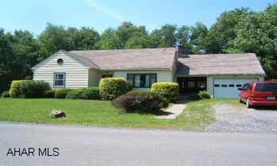 All original oak hardwood floors, lit closets,extra storage above patio and under garage and patio, large heated attic, most windows new,large picture wndow in lr.,extra  outlets in every room