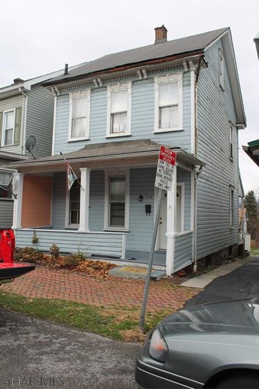 This vinyl sided home has great potential. Wonderful chance to invest with endless potential for returns. Home features carpeted second floor and laundry on the main level.