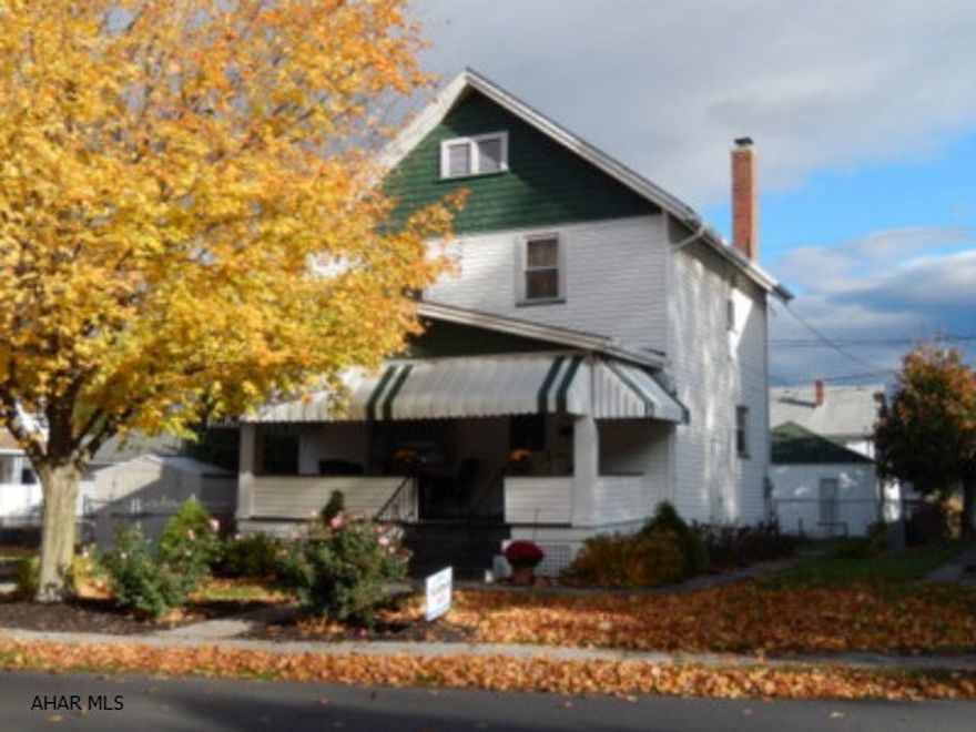 Don't miss this darling updated 2 story in Toy Town with fenced back yard, garage, garden and paved driveway. Hardwood floors.  Powder room on the 1st floor. Newer Roof and Hot Water Heater. Just move in! This house does NOT require flood insurance!!