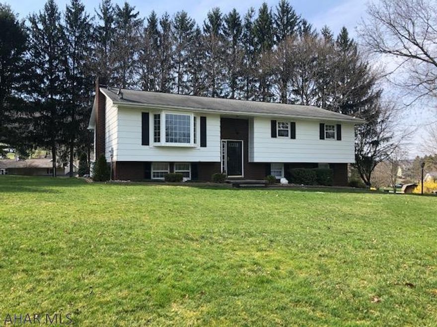 3 Bedrooms 2 Bath Bi-Level in Quiet neighborhood on a large corner 1/2 acre lot with nice tall Pine Trees across the back for privacy, 3 season Sun porch and a Deck off the Kitchen makes for Great Entertaining, many updates with New Carpet upstairs and Lower Basement, all New upstairs Bathroom, New Counter Tops in Kitchen, and New Flooring in Laundry Room and Lower Bathroom.  2 Car Integral Garage a Must See!  Call Listing for Private Showing.