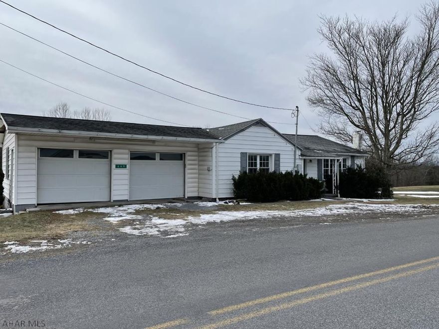 Excellent investment opportunity!  Big open rooms, hardwood floors, first floor laundry, 2 car garage and one acre of ground add up to tons of potential.  Located on a quiet country road in rural Bedford County.