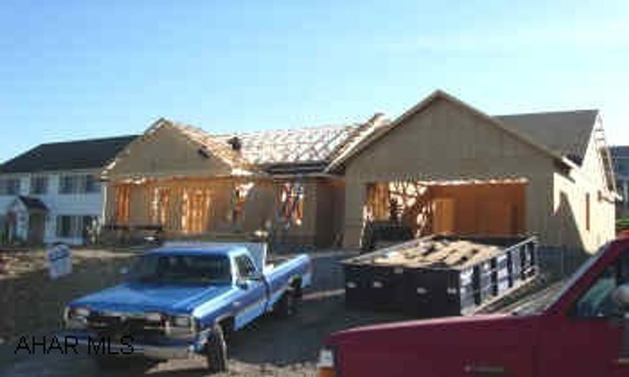 ONE STORY LIVING, 8X12 COVERED CEMENT PATIO IN REAR, RETAINING WALL TO BE BUILT IN BACKYARD, OPEN FLOOR PLAN.