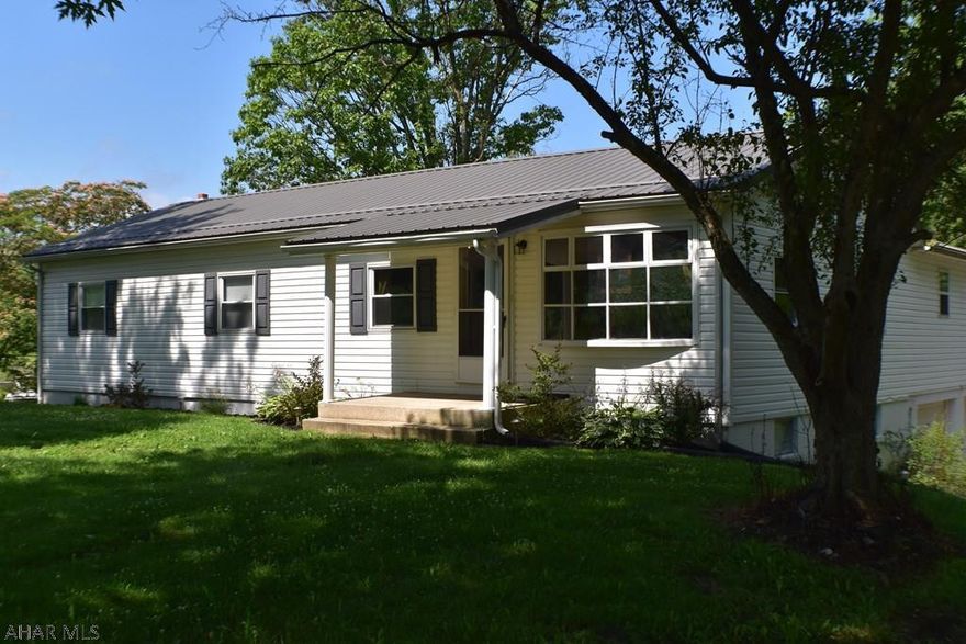 This spacious 3 bedroom, 2 bath ranch is just a short drive from historic downtown Bedford and Shawnee State Park.  The open concept is perfect for entertaining.  The small stream running through the backyard creates a relaxing atmosphere for any backyard BBQ!  When the outdoor season is over the newly installed pellet stove will keep you cozy all through the colder months.