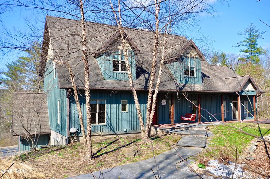 Newly transformed into a 4-bedroom home, this stunning, custom-build home is situated on a secluded lot just under 2 acres! You can reside in a peaceful atmosphere and yet, have the luxury of being only approximately 10 minutes from Wegmans, Lowes, Mount Nittany Medical Center and Penn State University. From the Board and Batten siding down to the antique doorknobs, this impressive home is overflowing with charm! Outside, you can enjoy the tranquil setting by choosing the elevated deck overlooking the woods, or the balcony off the second level, or the swing on the front porch. In addition to all of these, the ground level deck, the patio off the side entrance, the firepit and the abundance of parking make this an outstanding property for outdoor entertainment. Even the dogs will enjoy playing outside with the underground electric fence recently installed. Inside, the peacefulness continues where the walls and ceilings contain strategically placed acoustic insulation. Most everything inside this home is either brand new or recently renovated within the past 5 years. The kitchen has recently been remodeled with birch cabinets, granite countertops, wood ceiling and stainless steel appliances (including a built-in oven and 5-burner gas cooktop). The primary bedroom on the main level has a renovated full bath, multiple closets and a walk-out front porch and deck area! The 2-story family room features many windows, skylights and fascinating lighted cross beams. The spacious upper level has recently been converted into 2 more bedrooms. This level also includes a beautifully renovated full bathroom, multiple nooks and closets and a covered balcony overlooking the property. The finished portion of the lower level consists of a large, efficient laundry room, a bonus room for hobbies and/or storage and also a mudroom connecting the two separate oversized garage bays. The unfinished portion of the lower level is already studded and pre-plumbed to create even more possibilities for the property. This area has its own private side entrance and separate utilities, so it could potentially be used for business, an in home office, an in-law suite, a separate apartment or an income-producing adventure. Throughout this entire home there are many other superior features. Some of these include: solid oak flooring, recessed lighting, birch cabinetry, high ceilings, cedar storage closets, smart thermostats and sold wood doors. Utility highlights include: high-efficiency dual heating zones, Carrier A/C cooling system, a whole house water softener, a Neptune ultraviolet water disinfection system, a Culligan system for drinking water in the kitchen, a whole house dehumidifier and additional gas lines for future needs. You will surely want to call this private, one-of-a-kind property your forever home once you come and see it in person! Call to get your showing scheduled! (Property is currently being used as an Airbnb and the entire furniture package is available for sale)