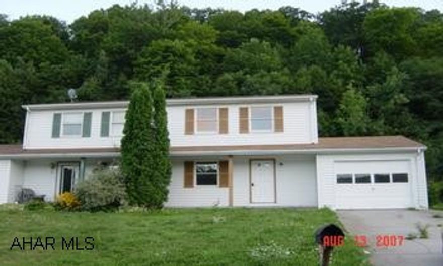 Freshly painted and redone 1/2 double in Eldorado Springs.  3 bedrooms, eat-in kitchen, garage and patio.