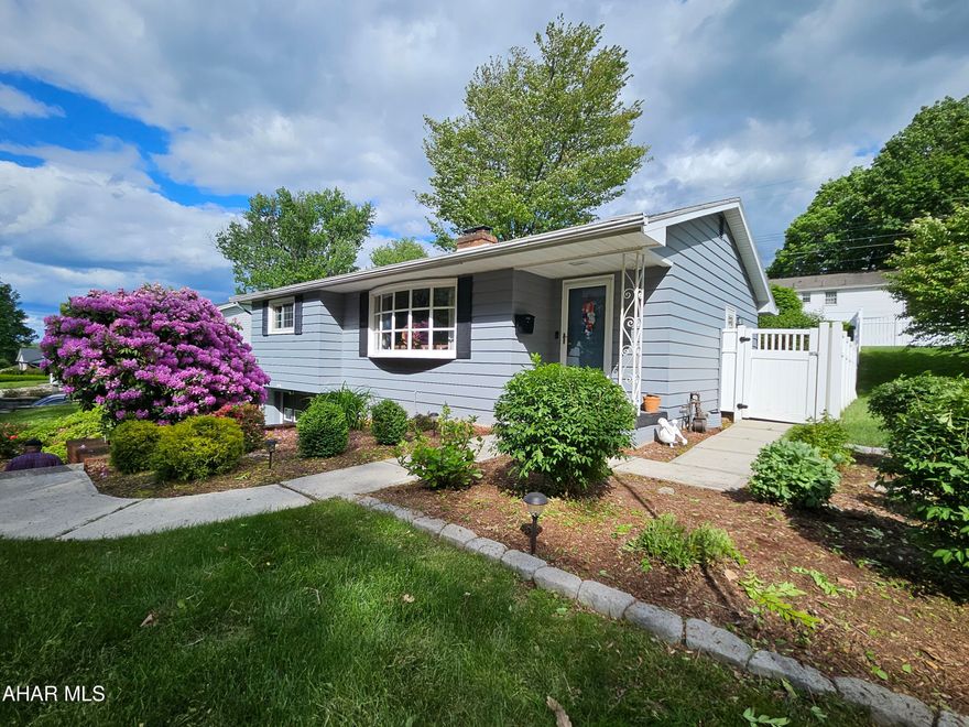 Step into this beautifully updated 1960 raised ranch.  This one time owner home boasts 3 spacious bedrooms and 2.5 baths, this home offers comfort, style, and functionality throughout. The master bedroom includes its own private half bath.
The heart of the home is a large living room that is flooded with natural light from the oversized bay window that overlooks the woods and extensive landscaping.  Enjoy cozy evenings in the expansive living room, featuring a unique two-sided fireplace that adds ambiance and charm to both the living and dining spaces.  The kitchen is trimmed in cherry and granite kitchen.  There are hardwood floors throughout the home under the carpet.

The finished basement extends your living area, ideal for a family room and home office, or guest space.  There is a large bath with plenty of storage in the lower level that adjoins the well thought out laundry space.  There is no shortage of storage throughout the home.  Garage has the capacity to hold 2 vehicles.

Step outside to a deck and fully fenced yard offering both beauty and privacy. Whether you're hosting gatherings, gardening, or just relaxing, the outdoor space is as inviting as the interior.

This turn-key home blends the solid construction of the 1960s with all the updates and conveniences of today — a true gem ready to be enjoyed.