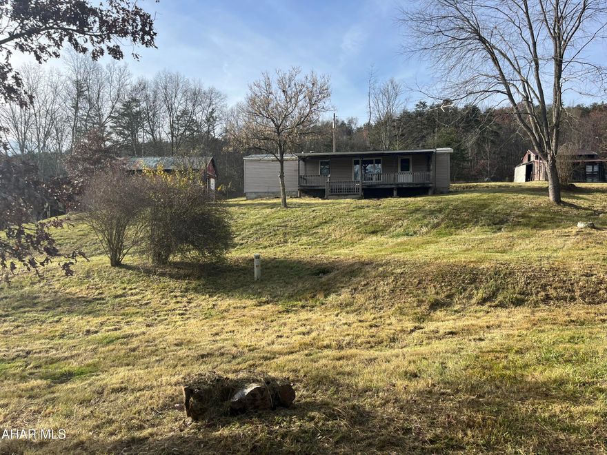 IF YOU ARE LOOKING FOR A HUNTING CAMP WITH WELL ,SEWER, ELECTRIC OR A WEEKEND GETAWAY OR JUST A SPOT ON 10.94 ACERS TO BUILD YOUR DREAM HOME LOOK NO FURTHER. THIS PROPERTY HAS AMBLE WOODED GROUND TO HUNT AND IS LESS THAN 1 MILE  TO STATE GAME LANDS . PROPERTY IS BEING SOLD AS IS. DON'T MISS THIS ONE . IT HAS PLENTY OF POTENTIAL.