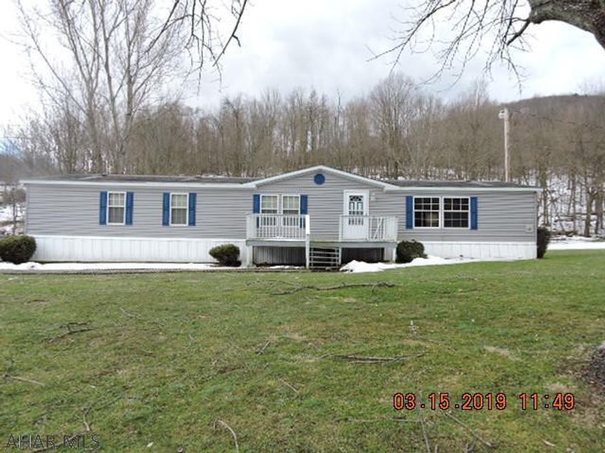 Huge double wide with nice big rooms.  Private location.  There is no title for the Mobile Home..AS IS WHERE IS SALE.  Hook up for wood burner .Plumbing to MBA tub is not hooked up.