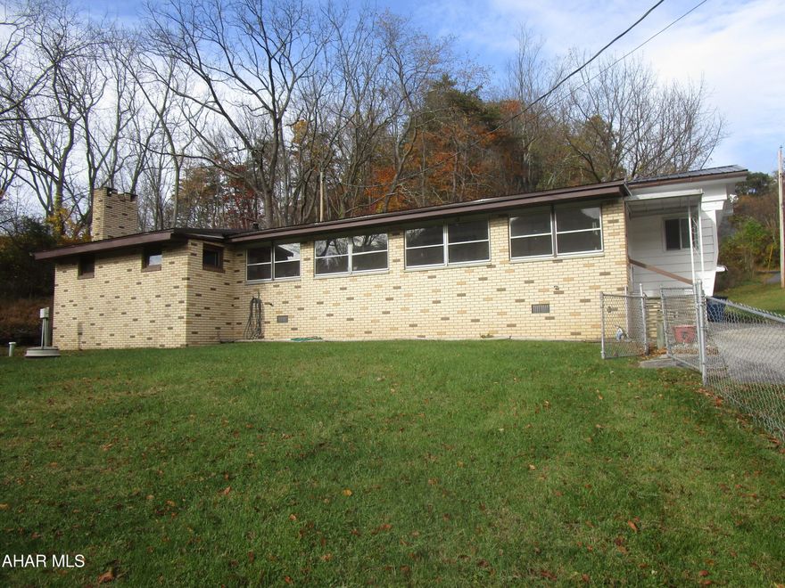 Single-wide manuf. home built 1972+- w/ numerous additions. Central air.  Newer metal roof. Very well-kept.  Spacious ft. yard w/ chain link fencing & stg. shed. Conc. driveway (culvert underneath).  Two(2) bedrooms w/ cedar-lined closets & built-ins; 1.5 baths; laund./entry rm.; open concept eat-in kitchen-living rm.; family rm. addition w/ FP w/''Harman'' wd. stove insert; lovely sun porch add.(no heat); enc. rr. porch open to combo 1-car att. garage/workshop. State Game Lands; 'Raystown Branch'; H & BT Rails-To-Trails very close. NO title to trailer. CASH only.  Buyers to provide proof of funds prior to viewing property. Buyers are responsible for confirming the real estate taxes, site area, the sq. feet of gross liv. area & Hopewell Twp. info (652-5743).  Penelec. Hopewell sewer.