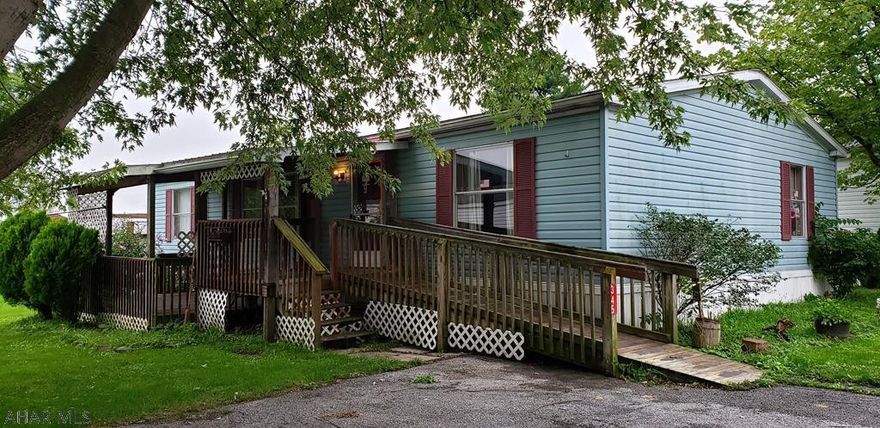 Spacious doublewide with lots of potential.