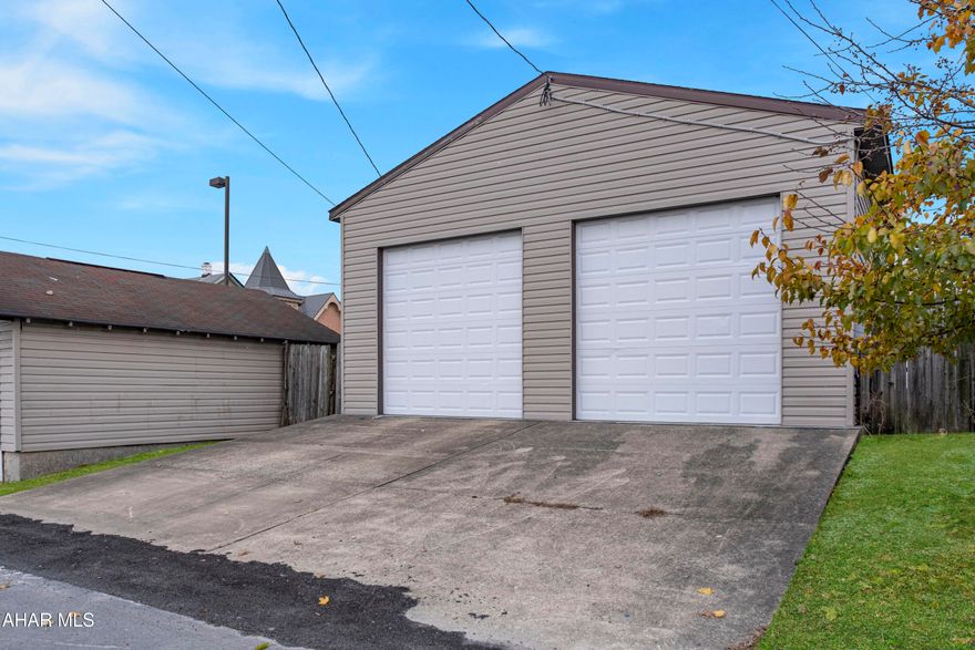 Rare opportunity to own a large 28x28 storage garage in Altoona, featuring high ceilings and an additional storage shed. Low taxes make this an affordable option for personal use, workshop space, car storage or rental income.