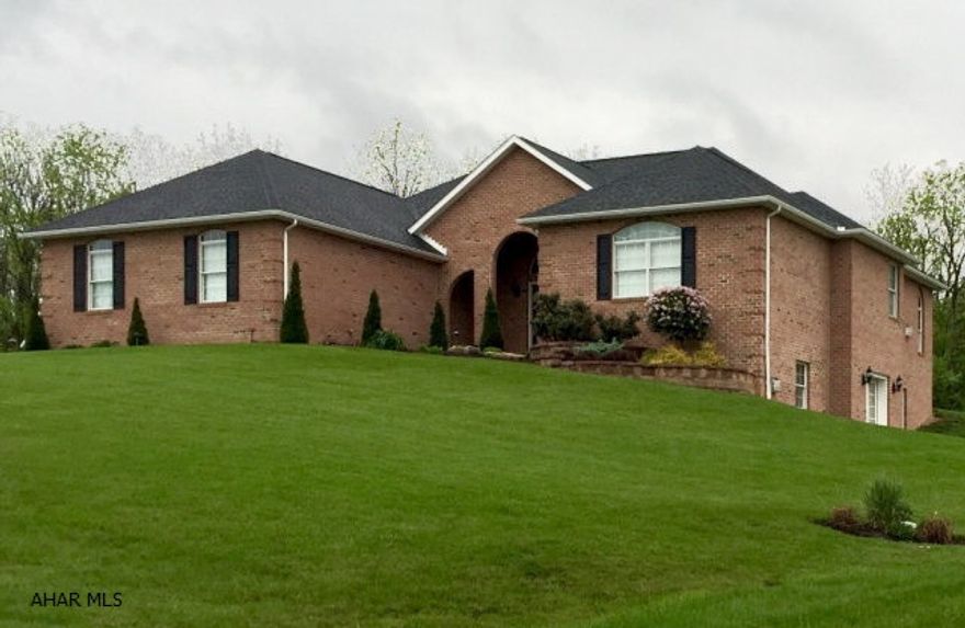 Located in historic Bedford County is this hard to find custom built, high end 4 BDRM, 3 bath home with gorgeous finished walk out lower level and oversized 2 car garage. The full exterior brick home offers maintenance free exterior living. High end features like granite counters, designer kitchen, tray ceilings, floor to ceiling stone fireplace, 9' ceilings, walk-in closet, Jacuzzi tub are just a few of the many upgrades. The lower level offers a wonderful additional bedroom with walk in closet, office, built in bar and huge entertainment area with stone fireplace. Plenty of natural light floods both the upper level and lower walk out basement. Located near, shops, hospital and doctor's office.