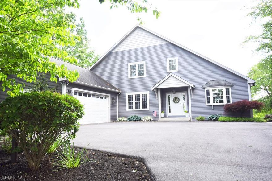 Well built custom home on very private lot in Fox Hollow.  Hardwood entry.  Spacious rooms.   With the main floor master bedroom suite, the home offers comfortable living all on one floor with the added bonus of lots of extra space for family both above and below!  Bright and cheery sunroom adjacent to well planned out newer kitchen.   Large home office has very nice built in cabinetry, book cases,  and Corian countertops.  Main floor laundry room with nice counter space, sink, and cabinetry.  Oversized two car garage with storage.  Other features include central vac, multiple zone heating with radiant heat in floors on main level, and central air.   The home also offers a beautiful outdoor entertaining area with lovely views from the covered composite deck and paver patio.