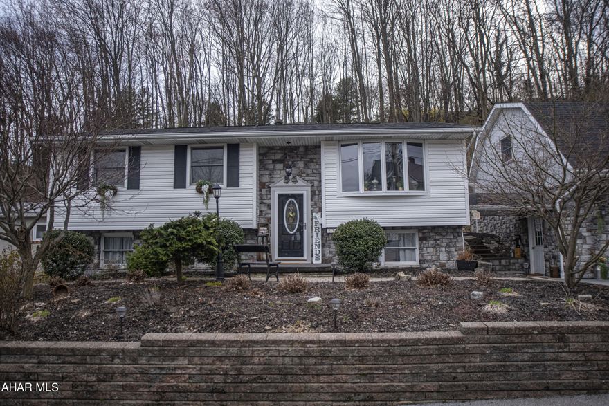 Check out this very well maintained  bi-level home with a large 2 car garage. This home has beautiful woodwork throughout and so much character. Laundry is conveniently located on the main floor but can easily be converted back to a 3rd bedroom if preferred. The bonus room has cathedral ceilings with skylights. The finished basement has a family room and fireplace with another room you could use as a bedroom. The garage offers an upstairs loft with plenty storage space. Don't miss out and come check it out today.