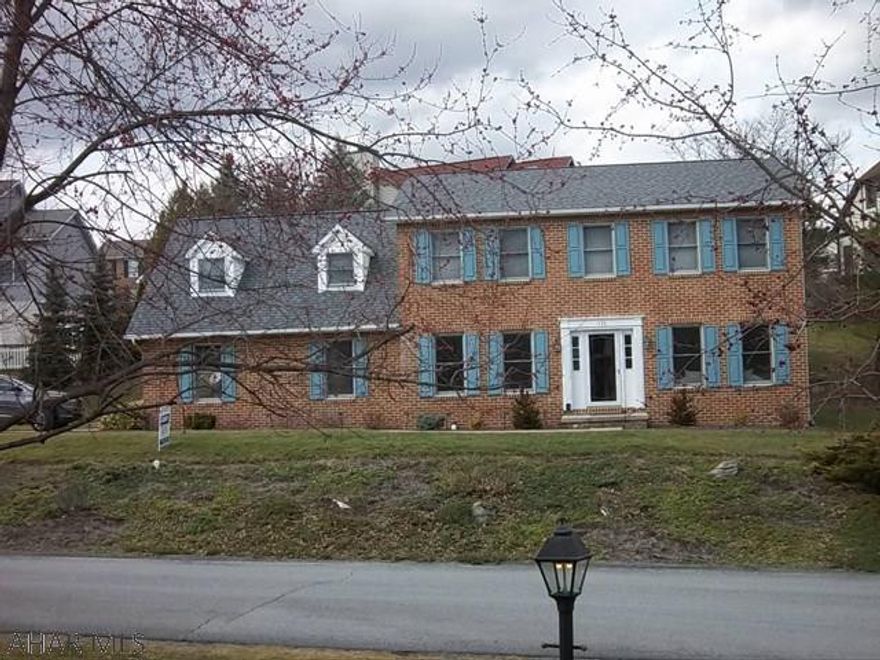 MOTIVATED SELLERS LOOKING FOR REASONABLE OFFER.  Awesome Colonial style home in Holliday Heights. Abundance of amenities in this 4BR, 4 bath home including a mother-in-law suite and many different spaces to relax. Laundry on the second level for convenience. Huge master bedroom with a walk in closet and makeup area attached to bath. Large basement rec room and workshop for the hobbyist.  The roof is less than one year old and the home features an oversized two car garage. Come see what all this home has to offer. Original owners lovingly maintained this home and it is very apparent from the moment you walk thru the door.  See it now before it's gone!