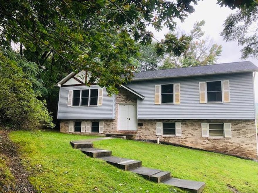 Looking for a home in the city with privacy? This is it! Home is situated on a quiet dead end street in the City of Altoona, close to everything. Home offers 2 bedrooms and 2 full baths. The largest bedroom has walk in closets and was originally two bedrooms opened up to make one. The  well equipped kitchen has a breakfast bar that is open to the dining room which opens to the living room. Walk out from the dining room to the deck for entertaining or have a pool party with the inground pool. The lower level offers a fireplace in the family room with a very unique bar. The lower level also features a large cedar closet and huge laundry/storage room.  There is a large room that would make a great 3rd bedroom that has a half bath.  This home is priced to sell!