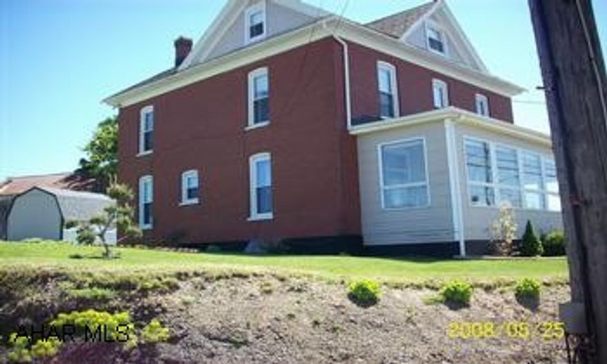 This historic home has been updated and well maintained.  4 bedrooms, living room, kitchen, and dining room.  There is a heated front porch for sitting in the winter enjoying your breakfast.