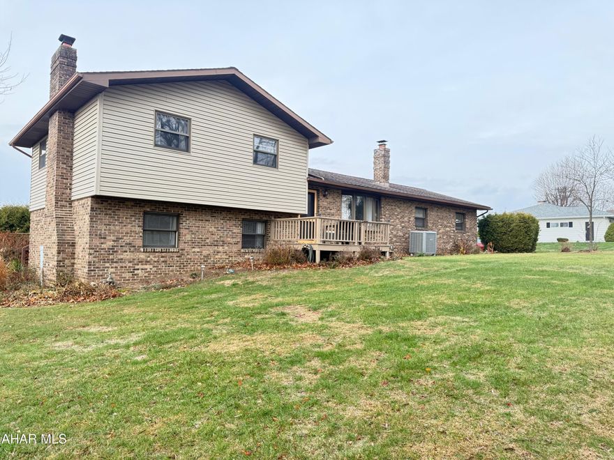 Discover the best of comfortable country living in this tri-level home, nestled within the beautiful, highly sought-after area of Martinsburg. This thoughtfully designed residence offers three levels of functional living space, perfect for families and entertaining alike.
The main level features a bright and inviting atmosphere with a seamless flow between the living room, dining area, and a well-appointed kitchen. Descend a few steps to the spacious lower level, offering a cozy family room with a large Brick Fireplace, recreation area, or a private home office. Also on this level, you will find the convenience of a half bath, laundry area, and an exit to the back yard. The upper level hosts the serene private quarters, including 3 comfortable bedrooms and a full bath, ensuring peace and quiet. Also, the home offers a wonderful sunroom with sliding doors off of the dining room area that overlooks the swimming pool and the large back yard.
Step outside to enjoy the expansive surroundings and the fresh country air. The property provides a perfect blend of indoor comfort and outdoor opportunity. Located in an exceptional neighborhood renowned for its scenic beauty and community feel, you're just minutes from local amenities while enjoying the peace of a rural setting.
This home is a rare find in a premier location. Schedule your private showing today and experience the charm of Martinsburg living!