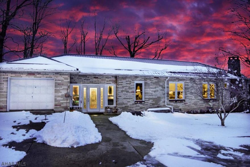 Relax & watch the wildlife!  This Central Cambria School District home is listed below current appraised value!  The home is spacious and bright.  It boasts a cozy fire place, 3 bedrooms, 5 garage bays & much, much more all situated on 4.5 magnificent acres!