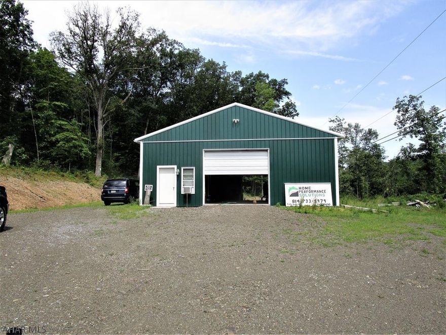 Build your dream home or hunting cabin on 1.5 acres (+/-) located on Route 30 near the entrance to Shawnee State Park. The site contains a 40 x 36 pole building built in 2013 with a concrete floor, one 9x10 overhead door, one 10x12 overhead door, underground 100 amp electric and undergorund phone service. The pole building contains a finished office with electric heat and a window air conditioner. The property is just minutes from downtown Bedford, the PA Turnpike, and Interstate 99. Sale is contingent upon subdivision approval.