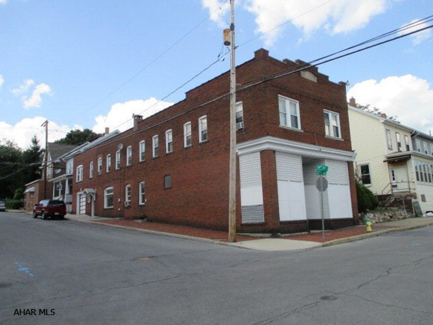 Five unit brick apartment building 1-1 bedroom 3- 2 bedrooms and a large store front now being rented as storage could be a 5th apartment and 1 car garage you can rent. Seller has done a lot of updates to this building along with two new furnaces. Three apartments rented with one two bedroom still vacant.