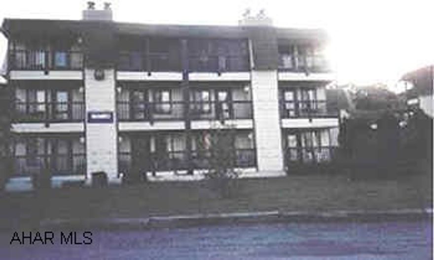 Third floor 2 bedroom condo. Assoc. dues of $175 per month include trash, cable, exterior maintenance, use of pools & tennis courts.