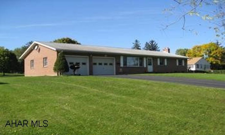 Well maintained brick ranch. Central air, 3 fuel options. Large in-town lot. Well built and maintained brick ranch home located on a large in-town lot. Plastered walls, Andersen windows, new hot water heater, oak woodwork. Home has central air as well as a whole-house fan. Your choice of fuel - oil, coal or wood. Includes kitchen appliances.