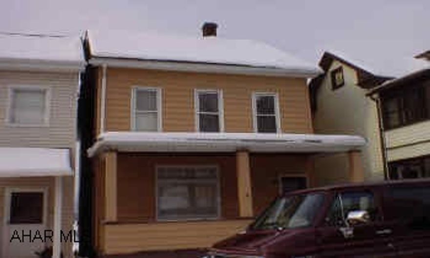 2 1/2 Story Aluminum Sided Great starter home or investment being sold "AS IS"