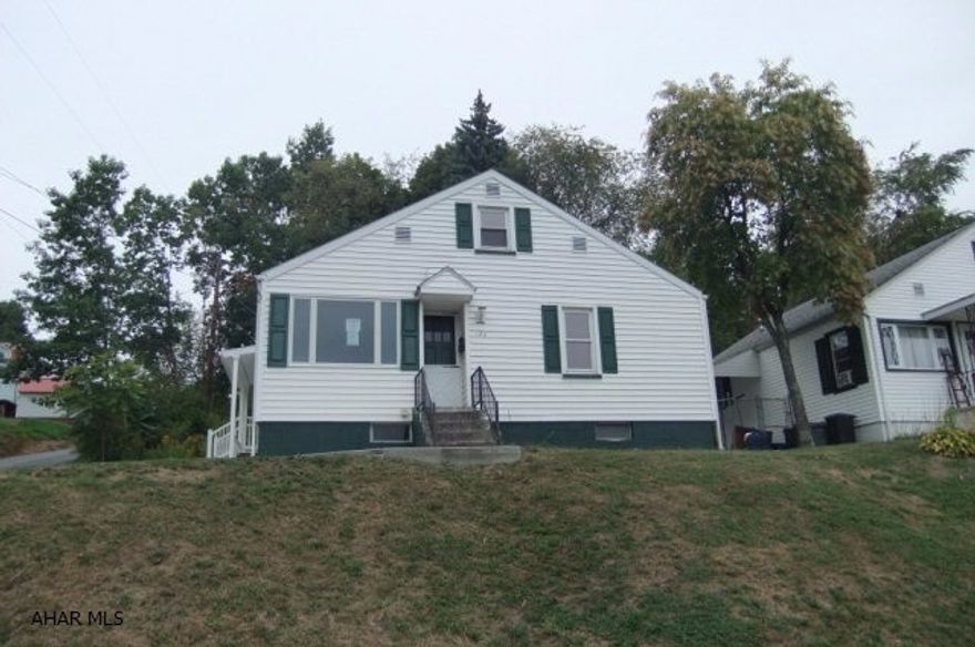 Pleasant Valley vinyl Cape Cod with some nice updates, but needs some work. Hardwood floors, newer carpeting, updated bath, kitchen cabinets missing. Property sold AS-IS. Seller will make no repairs. Offers must be submitted through HUD approved broker. Buyer pays both transfer taxes. Equal Housing Opportunity.