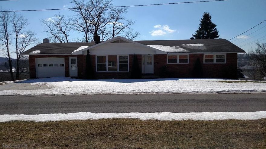 Open House - Sunday, March 17th, 1:00-3:00 pm.  This 1-story brick home is bigger than it looks.  It has been completely updated.  There are 4 bedrooms, 2.75 bathrooms, a 1st-floor laundry room, 3 spacious living areas, and 2 small bonus areas.  There is a 1-car garage and another storage garage on the lower level.  Must see to appreciate.