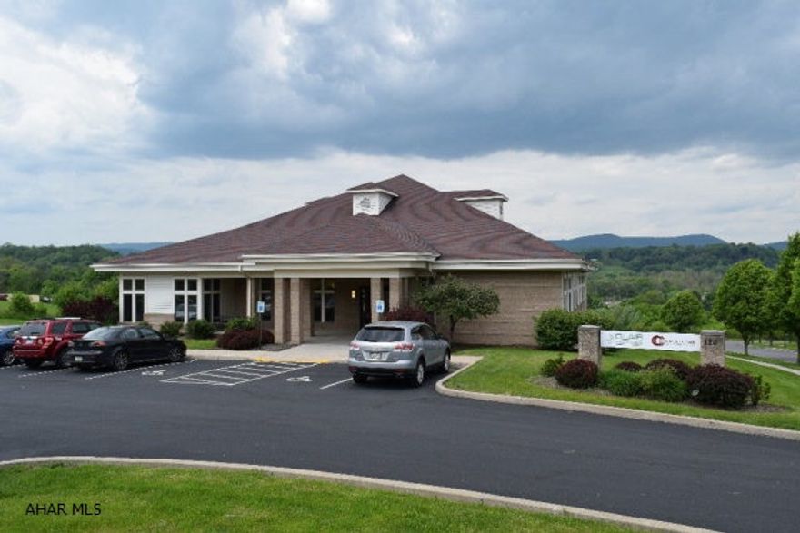 11,000 square foot modern professional office building located in Hollidaysburg just off of Route 22 and Plank Road. Fully rented with great lease history and tenant retention. 39 space parking lot and drive under garage to the lower level. Fiber optics in place. ADA compliant. Call listing agent for more information.