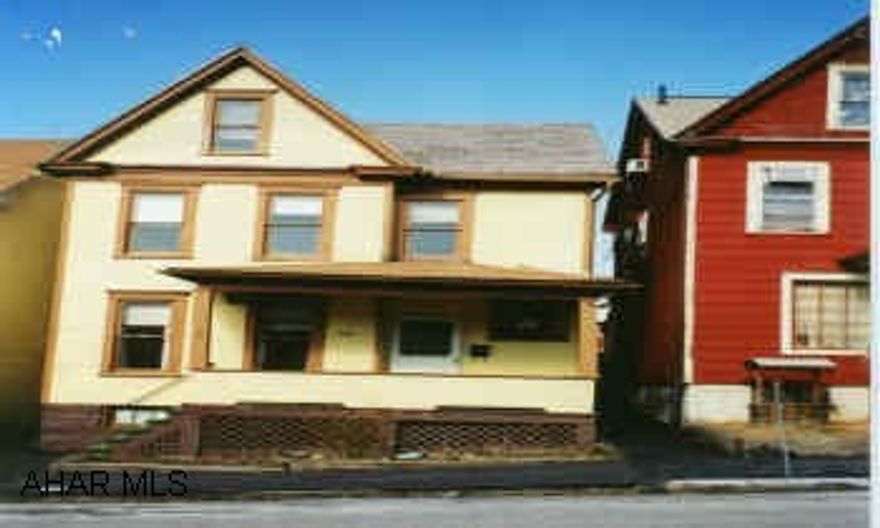 Finished attic, unheated, enclosed rear porch, fenced rear yard. Clean & Neat