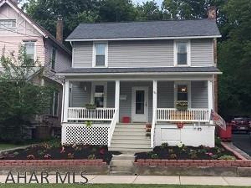 Turn key home in immaculate condition. Inviting front porch, double lot with private drive and ample parking. Beautiful landscaping. Home is inviting with neutral colors and original hardwood floors. All appliances stay. 10x20 newer shed with underground electric. Make this one yours!