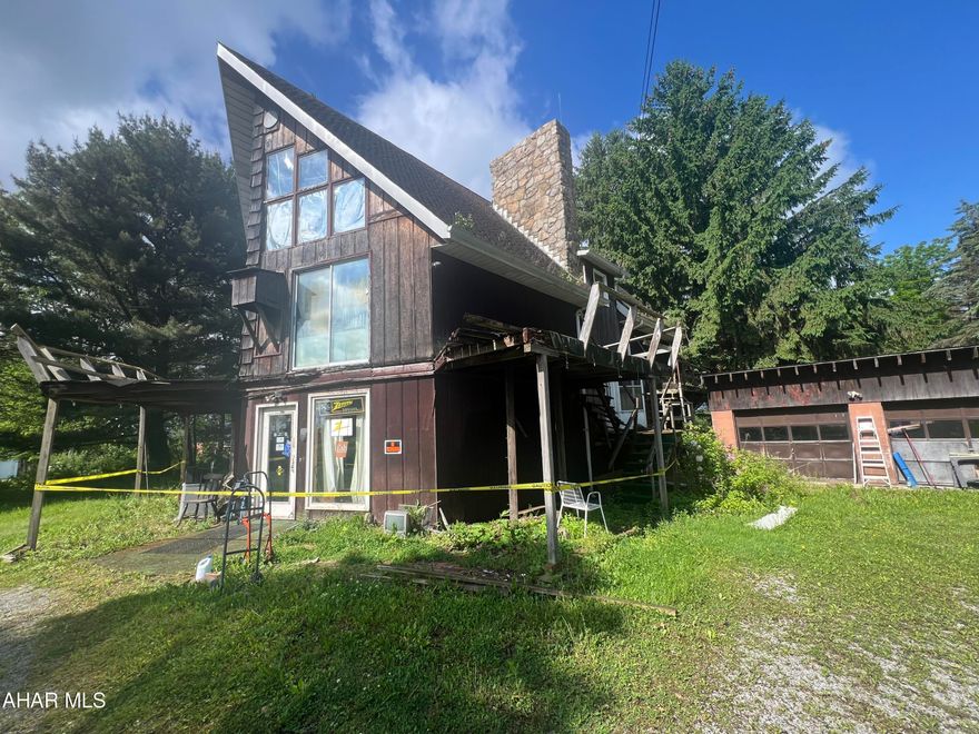 Handyman special - a frame in need of remodeling.  Needs complete interior updating. Basement appears to have a water  problem. Decks are poor and unsafe.  Will not qualify for a mtg in current condition.  Great rural location.