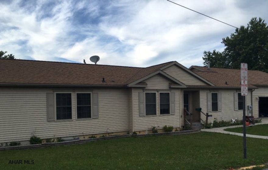 Large modular home, corner lot.  Large 2 car garage, living room, office or bonus room,  full unfinished basement with full bathroom.  Priced to sell.