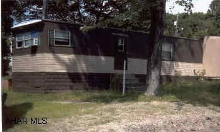 12x70 Mobile home on 50x120 lot.