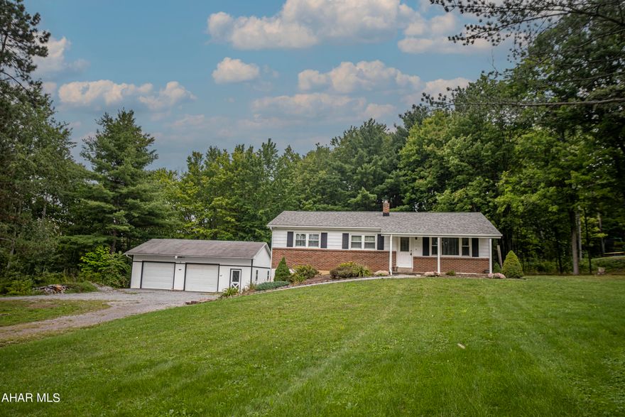 Don't miss out on this rare opportunity to own 1.8 acres in Altoona! A convenient location in a private setting. This one story, 3 bedroom 3 bathroom home has so much to offer. Spacious living area with plenty of natural light. Hardwood floors throughout. Skylights for natural lighting. Quiet evenings in the private back yard facing the woods. You have to see this huge  garage! It is perfect for cars, storage or every hobbyist dream! New roof is 3-4 years old. Pavilion is wired for a hot tub and perfect for entertaining! This home has so much potential to make your own!