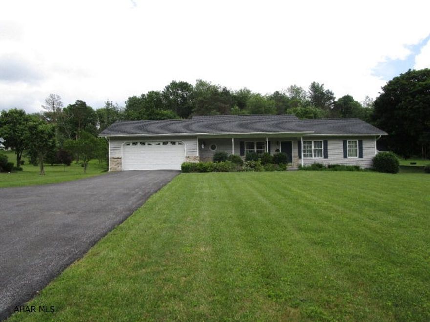 Very well maintained rancher built in 2000.  This home offers a living room with stone fireplace, kitchen with breakfast nook, dining area, master bedroom with master bath, two additional bedrooms with a full bath and first level laundry room.  Full basement, two-car attached garage, macadam driveway and storage shed.  Heat pump with central air conditioning, public water and sewer, thermo pane windows and 200-ampere electric.  Large front covered porch and rear deck.  Nice level yard containing .493 of an acre.