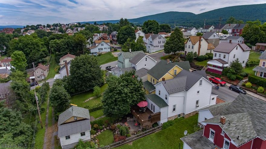 Move-in ready home in a quiet neighborhood. Home features a very open floor plan, 3 bedrooms, 1 bath, first floor laundry and a nice mudroom. Recently installed metal roof and some newer windows. Exterior features mature landscaping, bubbling rocks, landscape lighting, terraced garden, and a garden shed with lower level garage. Large deck above patio is a great place to entertain and has a great view of the city.