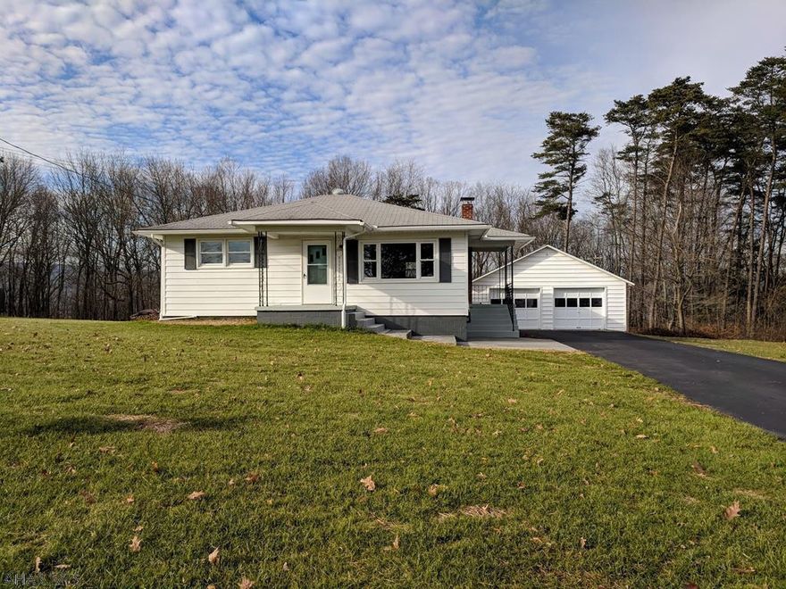 Newly renovated Ranch style home on over half an acre of land is now available!  New flooring and paint throughout, a neutral palette lets anyone move their furniture in without the need to repaint!  2 Bedrooms, 1 brand new bathroom, paved driveway, 2 bay garage, new septic system, new well pump, Central A/C, Oil forced-air heat and 200 amp breakers.  There it is on paper...or screen, now call and get your tour scheduled before this one is gone!