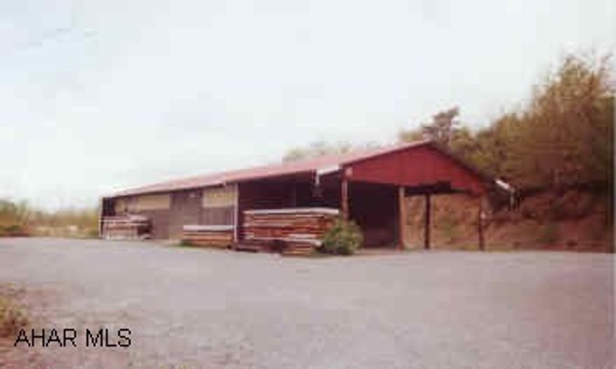 40'X72' STORAGE BUILDING WITH AN ADDITIONAL 40'X20' UNDER ROOF. APPROX. 2 ACRES. LARGE STORAGE BUILDING ON LARGE PARCEL. MANY POSSIBILITIES. TO BE SUBDIVIDED. APPROX. 2 ACRES.