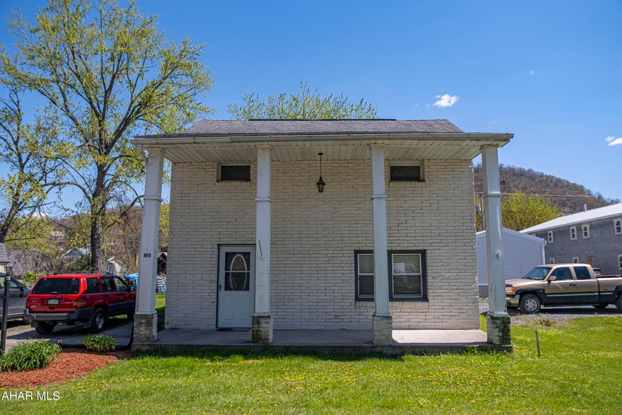 This renovated 2-story home boasts ,  two spacious bedrooms and a full bath. The living room offers comfortable seating for relaxing and spending quality time with family and friends. The kitchen has been updated with contemporary appliances and fixtures, providing a functional space for preparing meals. A convenient laundry room is also included, adding to the home's overall practicality.

From the kitchen, you can step outside to a large back deck, perfect for outdoor dining or basking in fresh air. The property features a large, flat yard, offering plenty of space for a garden, outdoor activities or entertaining guests.

The front porch of the home boasts pillared columns, creating a grand entranceway and providing a shaded area to relax on hot summer days. Additionally, the porch is covered, protecting the entrance from rain or snow.



Overall, this fully renovated 2-story home in the Spring Cove School District, offers ample space for comfortable living and entertaining, with modern conveniences that blend beautifully with its timeless charm. Schedule a showing today.