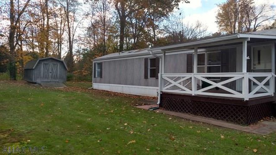 Nice single-wide mobile home in Bellwood.  Newer carpeting, island in kitchen, covered porch, and shed. Close to school. Lot rent is $275.00 plus $47 for the sewer bill. Buyer responsible for all utilities.