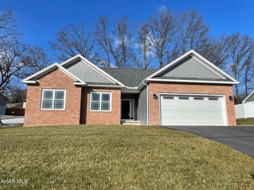 Step inside and you will notice the attention to detail and the quality of this new construction that you get with a Greg Dempsie build!  This spectacular bright and airy open concept ranch is beautifully laid out with the entertaining area at the heart of the home! Greet guests in the foyer and welcome them into the living room that features beautiful windows and an electric wall mounted fireplace.  There is plenty of space for a large dining room table and add stools on the island for extra seating. The kitchen has plenty of slow close cabinets to store all your pots/pans and beautiful countertops for meal prep. The appliances are included. Out the back door you will be ready for backyard barbecues with the covered patio for your grill this coming summer. After guests go home you can retreat to your large master suite with trey ceiling.  The master bathroom features a double vanity and stunning walk in tile shower with bench seat and shampoo nook.  There is a walk in closet for all your clothes and right off the master is the laundry room.  On the other side of the home you will find two spacious bedrooms both with large closets and a full bath between them.  The large open basement with high ceilings has been plumbed for a full bath if new owner would want to add additional family living space in the future.  No need to worry about snow on your car with the attached garage. This property is close to all restaurants, shopping and activities.  Call today for details!