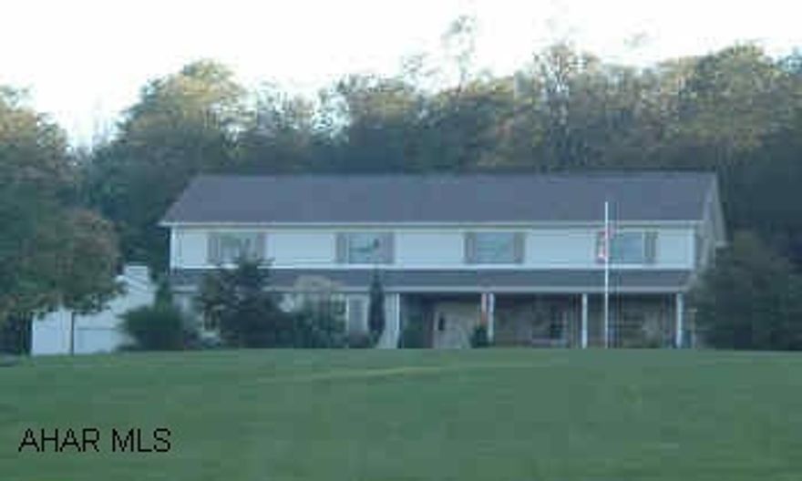 Large gorgeous house in private country setting.  Nicely landscaped, two 2 car garages - must see! Absolutely gorgeous 2700 +/- sq ft not including finished basement. Total country privacy, large lot, backs up to state game lands.  2 car integral garage, plus oversized detached garage.  Lush landscaping.  Will not last!!