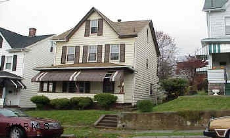 Lots of potential.  Newer windows, large rooms.  Above ground pool.