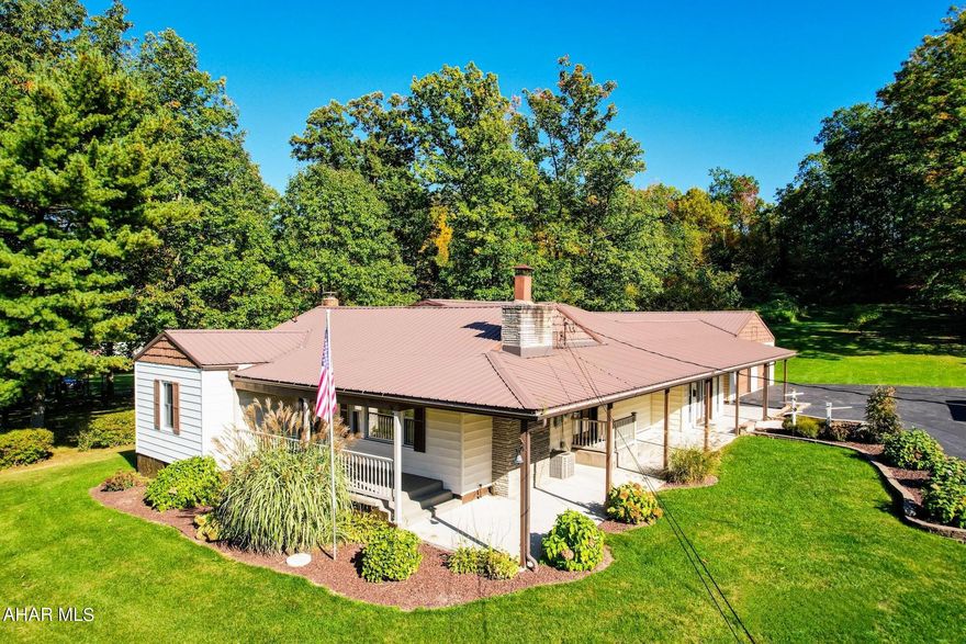 Step into this charming ranch and you will feel right at home. This home was filled with much love and it shows with all the care that it was shown. 2 car detached garage connected with a covered patio to the house. Walk into a nice size sunroom ( laundry  was moved to this area for convenience) has a family room with wet bar, lovely kitchen with plenty of cabinets, dining area and formal living room w/fireplace. 2 bedrooms and 1 and 1/2 baths . Bonus room with a closet that could be bedroom #3! Has a full basement. Home outside is so well kept, has lovely landscaping , paved drive and very nice back yard space. Call to take a look!